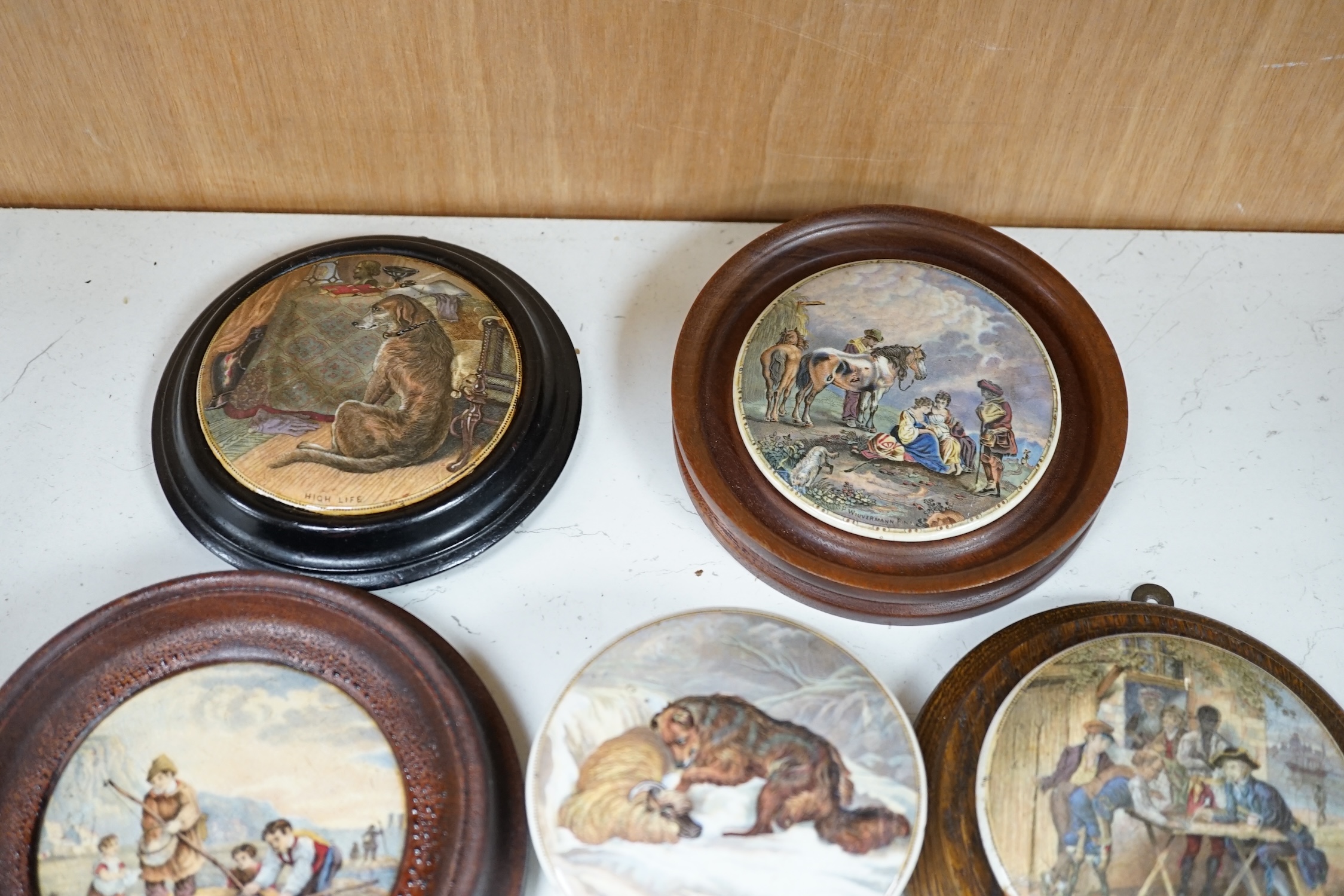 Eleven 19th century mostly framed pot lids including ‘The Snow Drift’, ‘War’, ‘High Life’, etc. Condition - mostly good, one cracked